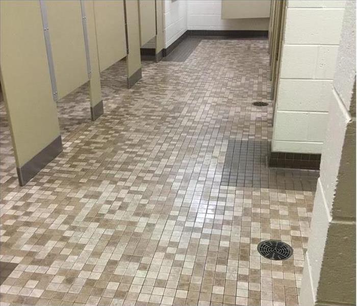 cleaned up sewage damage in commercial bathroom