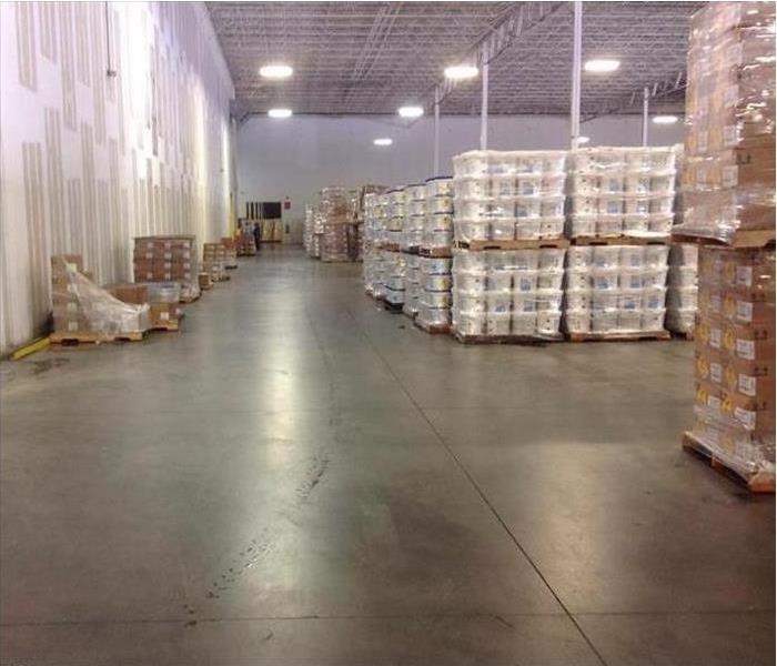 commercial warehouse standing water dried after water damage restoration